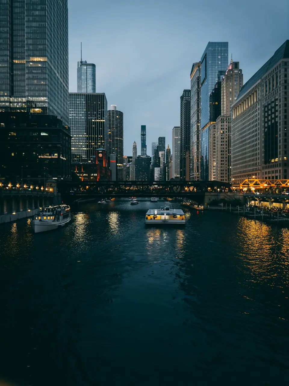 Chicago River and downtown architecture at dusk